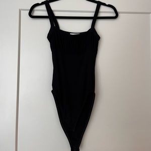 Size small. Topshop black bodysuit.